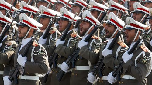 Iranian soldiers march during a military parade. (AAP)