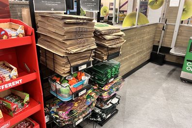 shopping bags at supermarket groceries coles woolworths aldi 