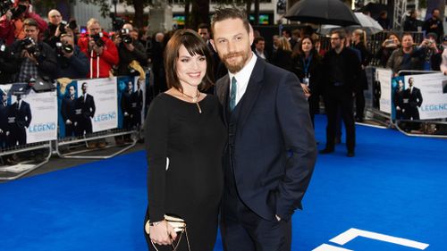 Hardy and his wife Charlotte Riley revealed they are expecting their first child at the premiere. (AAP)