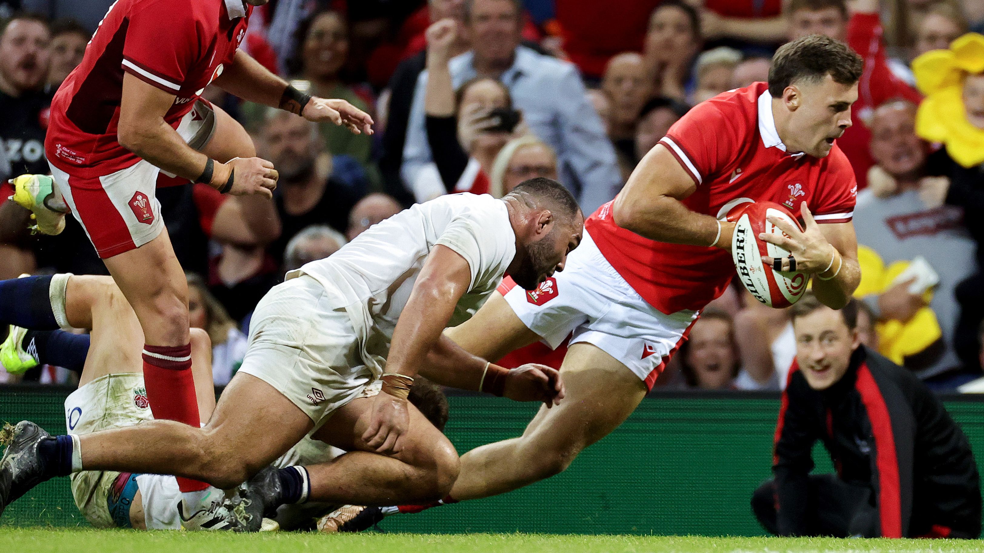 Mason Grady of Wales is tackled by Ellis Genge of England at Principality Stadium in Cardiff, Wales.