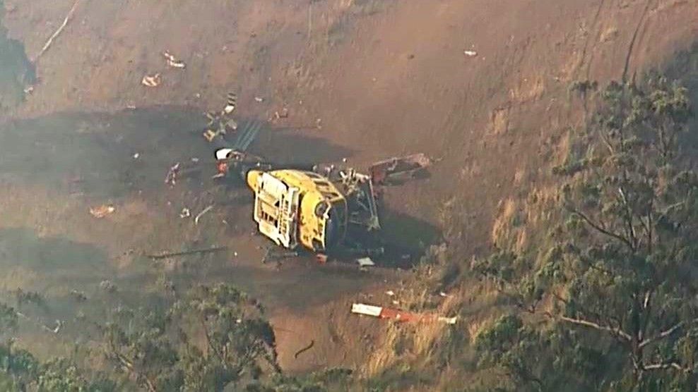 QLD fires Waterbombing helicopter crashes north of Toowoomba, Pechey Pilot survives
