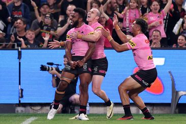 Sunia Turuva celebrates with teammates after scoring a try during the round four NRL match between the Sydney Roosters and the Penrith Panthers.
