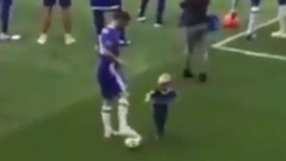 Chelsea star plays hard ball with toddler son