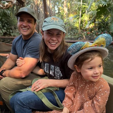 Bindi Irwin with her husband and daughter at Disneyland.