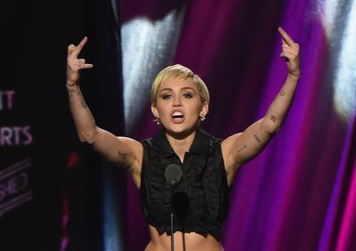 Miley Cyrus sat the the 30th Annual Rock And Roll Hall Of Fame Induction Ceremony in April 2015 in Ohio