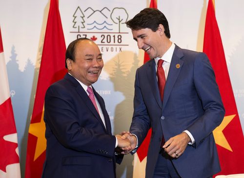 Trudeau, pictured with Vietnam's PM Nguyen Xuan Phuc, reiterated to Trump how tariffs would harm industry on both sides of the US-Canada border. Picture: AP