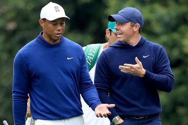 Tiger Woods (left) and Rory McIlroy.