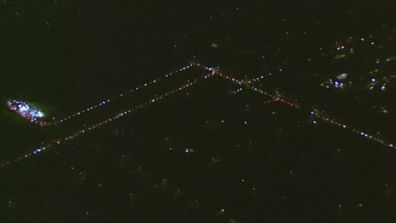 Aerial shots show the long lines of cars waiting for virus testing in Fairfield, south west Sydney.