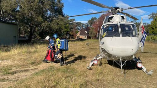 CareFlight personnel arrive at the scene in Kenthurst.