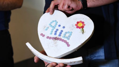 The family departed Melbourne with several tributes left to Aya Maasarwe from mourners.