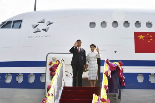 In this photo released by Thailand's Government Spokesman's Office, Chinese President Xi Jinping and his wife Peng Liyuan, arrive at Suvarnabhumi International Airport, Thursday, Nov. 17, 2022, in Bangkok, Thailand.