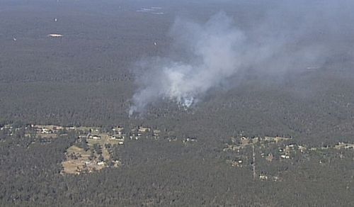 Large plumes of smoke can be seen as far as Penrith. Image: 9News