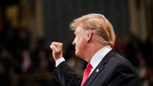 President Trump delivers a fist pump during his speech.