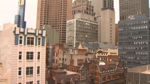 The burglar was spotted on the roof of a building in Melbourne's CBD. (9NEWS)