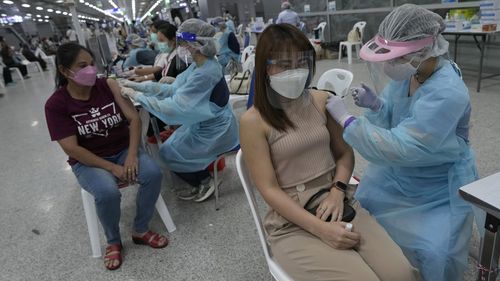 Thailand tightens measures as daily cases cross 10,000