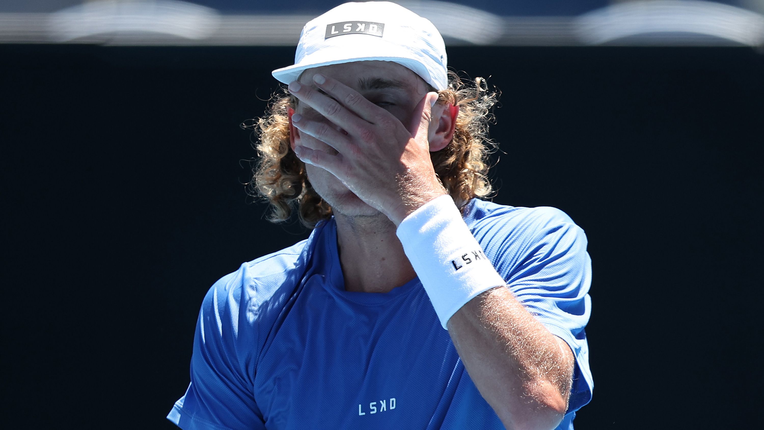 MELBOURNE, AUSTRALIA - JANUARY 16: Max Purcell of Australia reacts in their round one singles match against Mate Valkusz of Hungary during the 2024 Australian Open at Melbourne Park on January 16, 2024 in Melbourne, Australia. (Photo by Daniel Pockett/Getty Images)