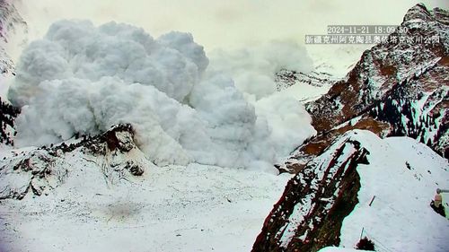 Cameras captured a  massive avalanche engulfing the entire valley below in seconds in China.