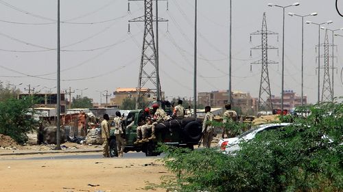 Army soldiers deploy in Khartoum on April 15, 2023, amid reported clashes in the city. 