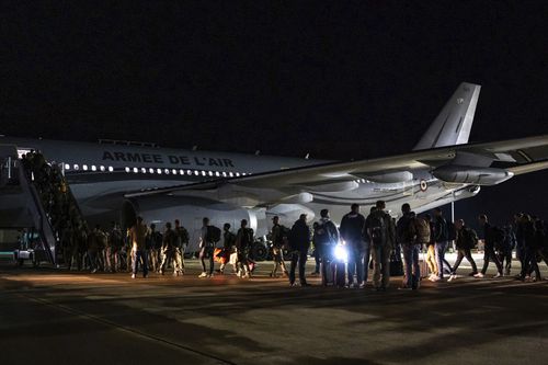 French Army forces embark on a plane to New Caledonia on Thursday, May 16, 2024 at the Istres military base, southern France.