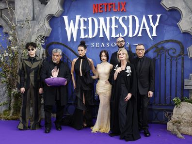 London, England - July 30: Isaac Ordoniz, Louis Joseman, Catherine Zeta Jones, Gina Ortega, Victor Dobanto, Joanna Loman Lom and Farid Armisen. "Wednesday" The second season, the first show in the first part of the Central Hall, Westminster on July 30, 2025 in London, England. (Photo by John Philips/Getti Emiez)