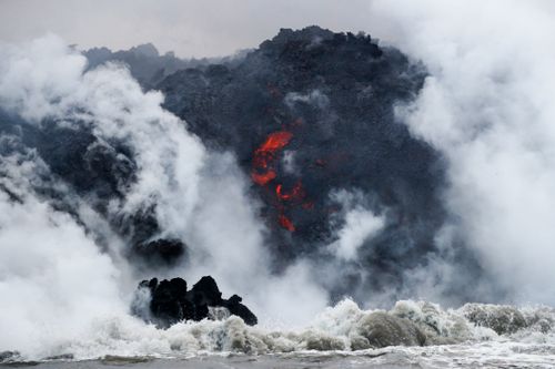 The people were aboard a tour boat that takes visitors to see lava plunging into the ocean from a volcano that has been erupting for two months. Picture: AP