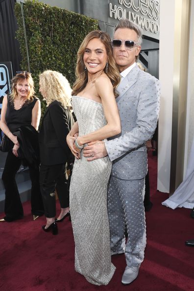 Robbie Williams and Ayda Field at the 82ND ANNUAL GOLDEN GLOBES®, airing live from the Beverly Hilton in Beverly Hills, California on Sunday, January 5, 2025 at 8 PM ET/5 PM PT, on CBS and streaming on Paramount+. Photo: Stewart Cook/CBS ©2025 CBS Broadcasting, Inc. All Rights Reserved.