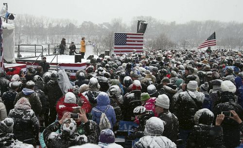 Amy Klobuchar tells supporters at a snowy rally in Minneapolis that she will be entering the 2020 presidential race.