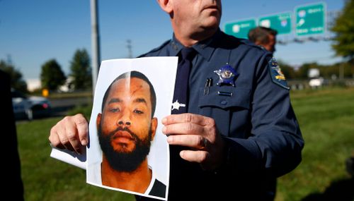 Harford County Sheriff Jeffrey Gahler displays a photo of Radee Labeeb Prince, the suspect in a shooting at a business park. (AP)