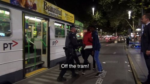 Police interceded with youths on the tram.