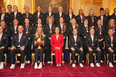 Britain's Kate, Princess of Wales, poses with members of the England Women's rugby team, at Windsor Castle, Windsor, England, Thursday, Jan. 15, 2026. (AP Photo/Kin Cheung, Pool)