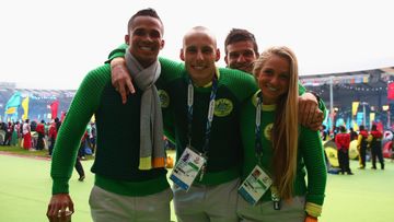 John Steffensen, Ryan Gregson and Genevieve Lacaze of Australia enjoy the atmopshere during the Closing Ceremony for the Glasgow 2014 Commonwealth Games. (Getty)