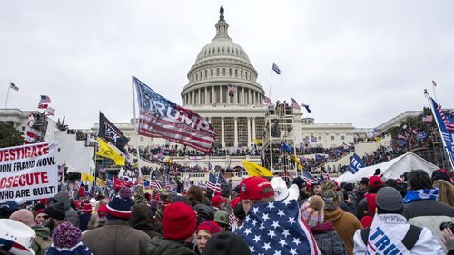 Rioters loyal to President Donald Trump rally at the US Capitol in Washington on January 6, 2021.