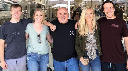 Kristen Dineen (pictured second from the right with her family) has lived in Bali for around five years. (Supplied)