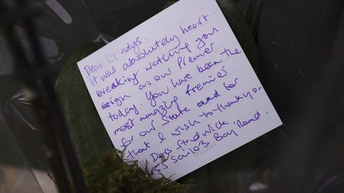 A note left on a bunch of flowers outside Ms Berejiklian's home. Gladys Berejiklian resignation