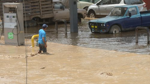 Hundreds of residents in the capital of Lima have been trapped by floodwaters. (AFP)