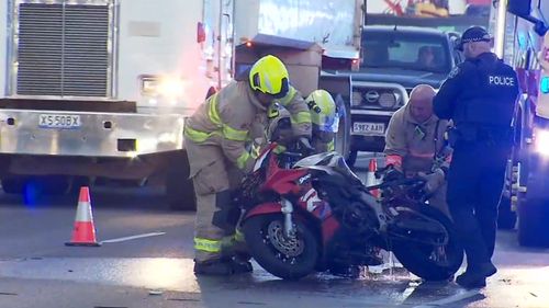 Police are searching for a motorcyclist who fled the scene of a fiery explosion in Adelaide that was caught on CCTV.