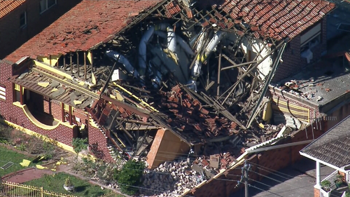 The Ashbury home partially collapsed.
