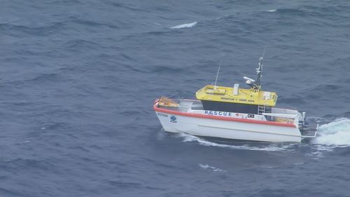 A desperate search is underway for a man who has been missing for almost a day off the coast of Queensland.﻿