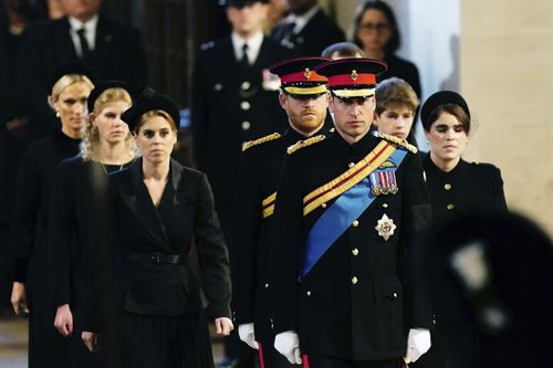 L-R: Zara Tindall, Lady Louise, Princess Beatrice, Prince William, the prince of Wales, Prince Harry, Princess Eugenie, Viscount James Severn and Peter Phillips attend the vigil of the Queen's grandchildren around the coffin, as it lies in state on the catafalque in Westminster Hall, at the Palace of Westminster, London, Saturday,  Sept. 17, 2022 