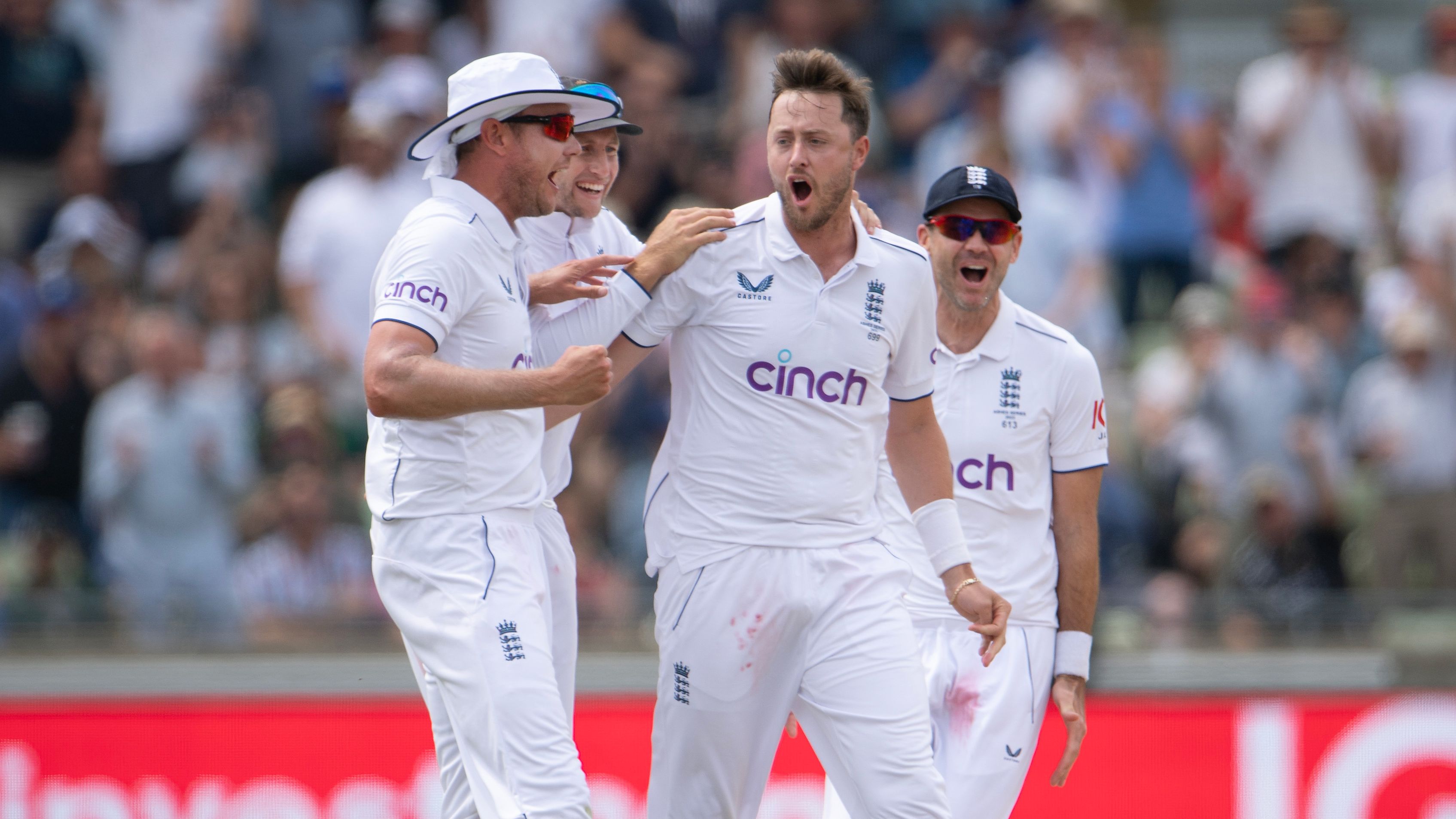 England bowler Ollie Robinson celebrates the wicket of Usman Khawaja.