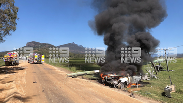 Two people have been taken to hospital after a car crashed and burst into flames following a police chase in the New South Wales Northern Rivers region.