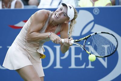 <br/><b>She's as famous for her good looks and flowing blonde hair as her on court proficiency.</b> <br/><br/>But Danish tennis beauty Caroline Wozniacki found the downside of her long locks in what can only be described as the ultimate bad hair day at the US Open.<br/><br/>In a comical incident, the world No. 10 was left all tied up when her ponytail became tangled mid-point against Belarusian Aliaksandra Sasnovich.<br/><br/>Wozniacki missed the return to lose the point but at least won the match - 6-3, 6-4.<br/><br/>