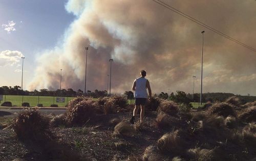 Massive plumes of smoke were seen flooding the sky as the bushfire grew in size. Picture: Matthew McOrist. 