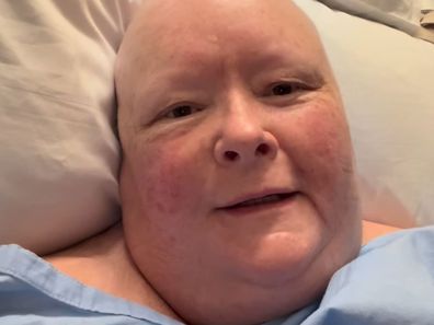 Magda Szubanski films a video message from her hospital bed.