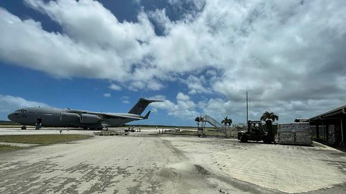 A Royal Australian Air Force C-17A Globemaster III aircraft delivers the first load of Australian Aid to Tonga's Fua'Amoto international airport on 20 January 2022.