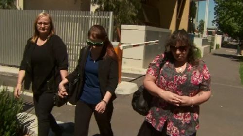 Ms Yean's family outside the Victorian Coroner's Court today. (9NEWS)