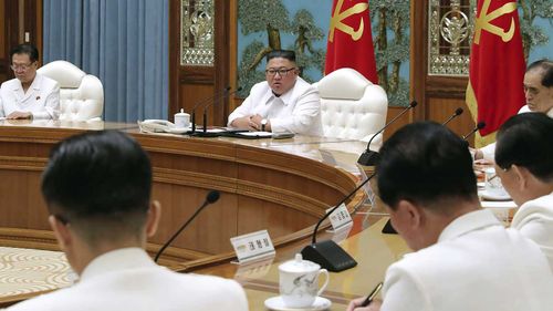 Kim Jong-un attends an emergency Politburo meeting in Pyongyang, North Korea.