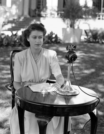 Princess Elizabeth, later Queen Elizabeth II, poses in front of a microphone to make a 21st Birthday speech, April 21, 1947, which she made from Cape Town, South Africa. 