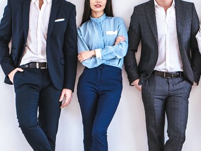 Two businessmen and a businesswoman