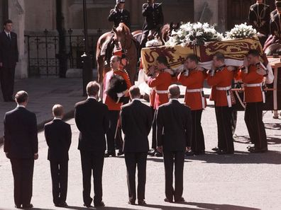 Princess Diana's coffin is brought to Westminster Abbey during her funeral, 1997.